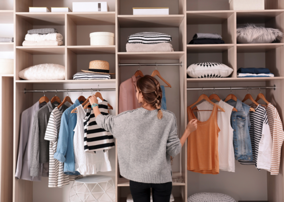 A woman wearing clothes in a room