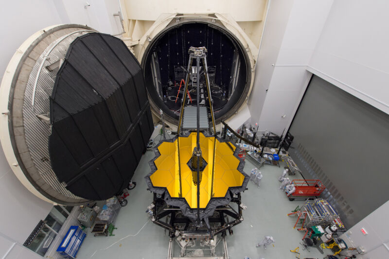 The primary mirror of the James Webb Space Telescope enters a vacuum test chamber at NASA's Johnson Space Center in 2017.